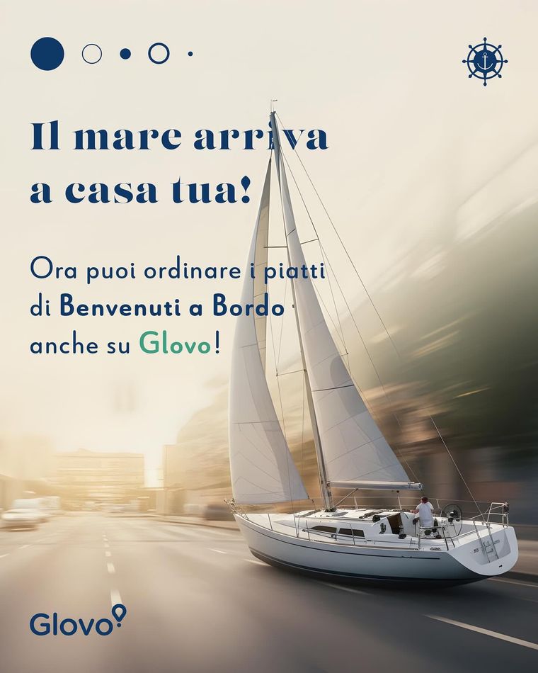 Post per il delivery: una barca a vela corre su una strada, titolo "Il mare arriva a casa tua!" e logo Glovo